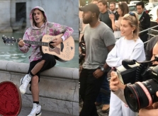 Justin Bieber vừa đệm đàn guitar vừa hát trên phố